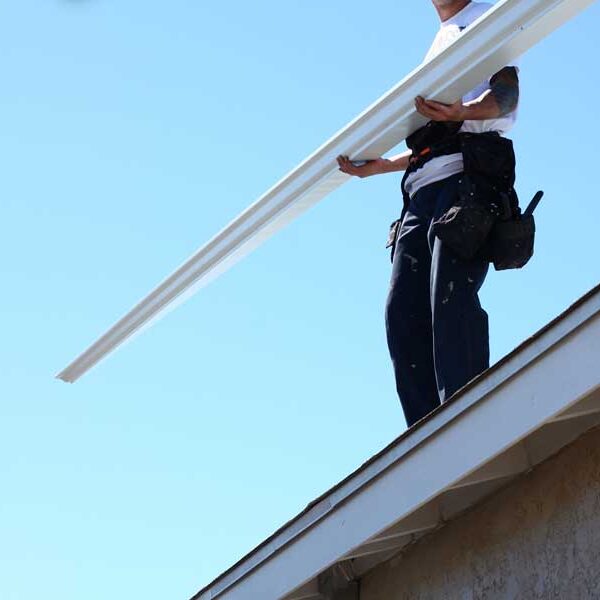 A roof that has recently undergone gutter installation in Tampa, FL.